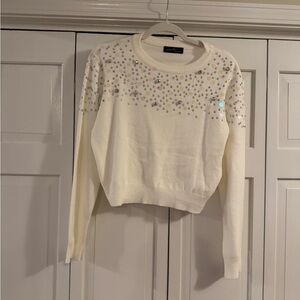 Large white sweater with jewels